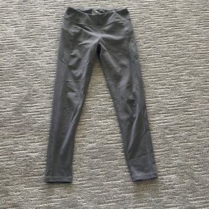Purple ish grey leggings, cute designs on the side